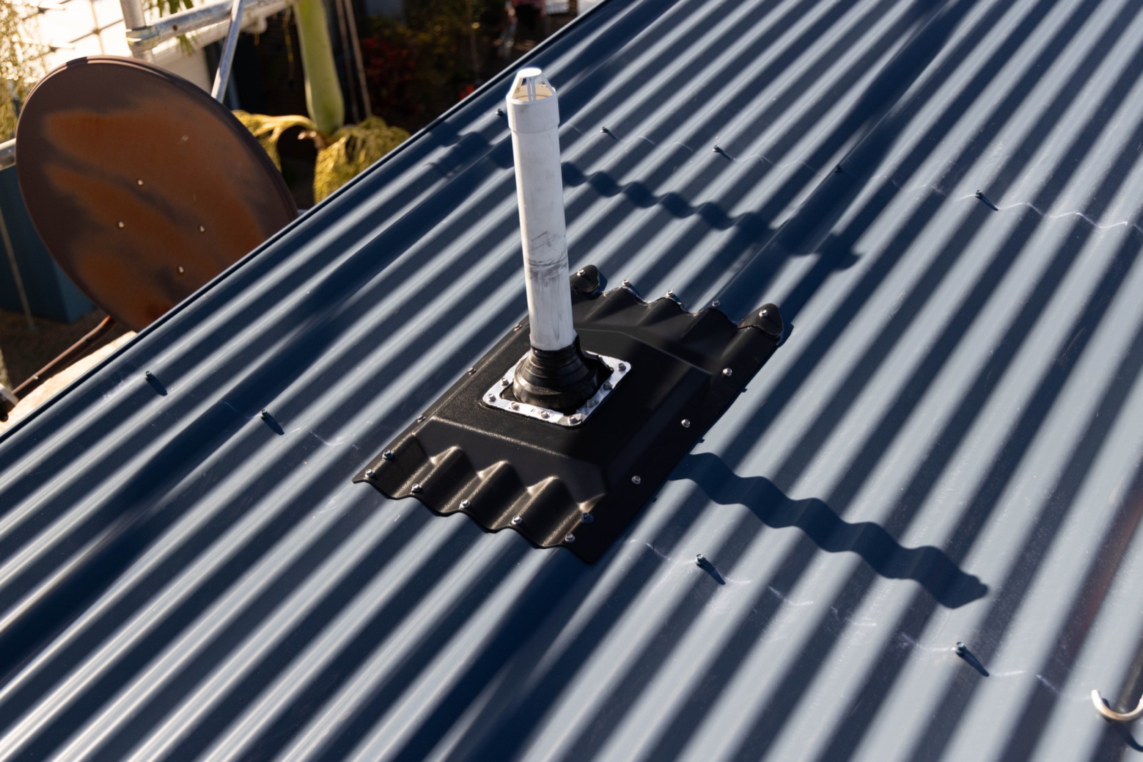 A completed Penenator install, rubber boot sealed on the raised flat platform
